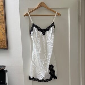 NWT 
Vintage Victoria's Secret White Slip with Black Lace Trim
2010
